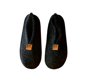 Warm, comfortable and cozy black slippers, home shoes handmade of felted wool, Nordic reindeer leather sole.