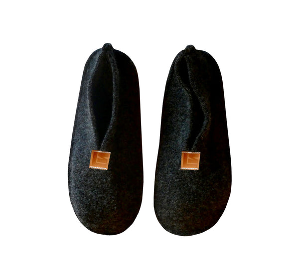 Warm, comfortable and cozy black slippers, home shoes handmade of felted wool, Nordic reindeer leather sole.