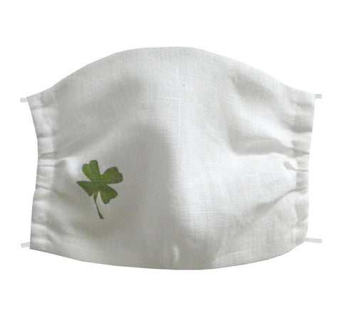 Washable and reusable handmade double layer face mask, 100% linen fabric, white with hand printed green clover figure, face cover .