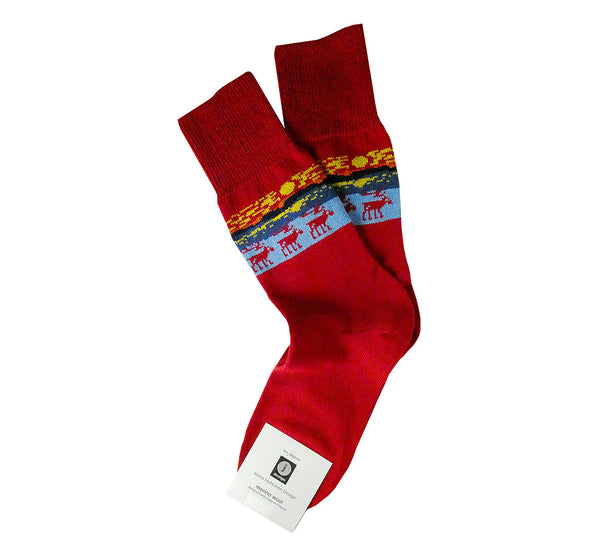 Pair of red merino wool socks, Lapland reindeer pattern, superwarm, resistant, ethically made in Scandinavia.