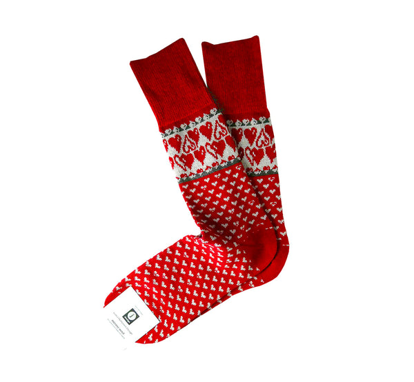 Red merino wool socks with small white hearts, cuff and heel black, superwarm, ethically made in Scandinavia.