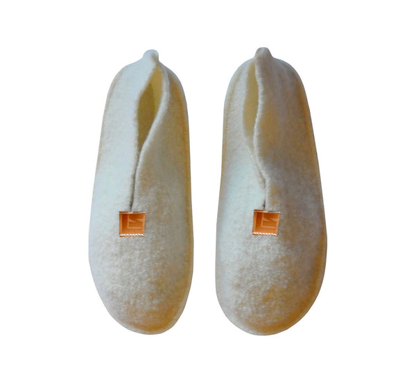 Warm, comfortable and cozy white slippers, home shoes handmade of felted wool, Nordic reindeer leather sole.